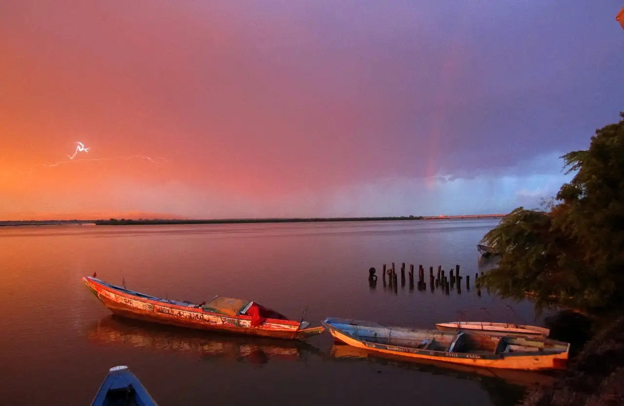 Arc-en-ciel et éclairs pendant l'hivernage en Casamance